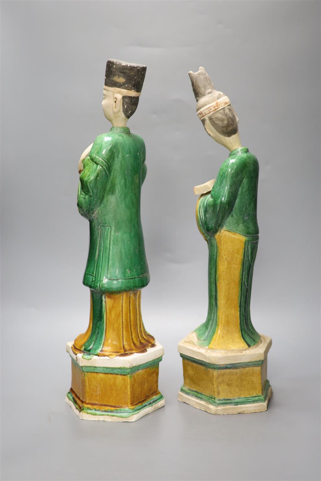 Two Chinese terracotta sancai-glazed male and female tomb figures, each with detachable head, tallest 47cm